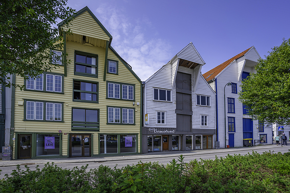 View of wooden harbourside shops and houses during daytime, Stavanger, Norway