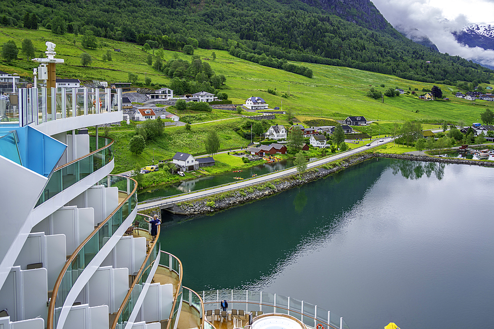 Aerial view of shoreline near Olden village and mountains from cruise ship in Nordfjorden during summer, Norway, Scandinavia, Europe