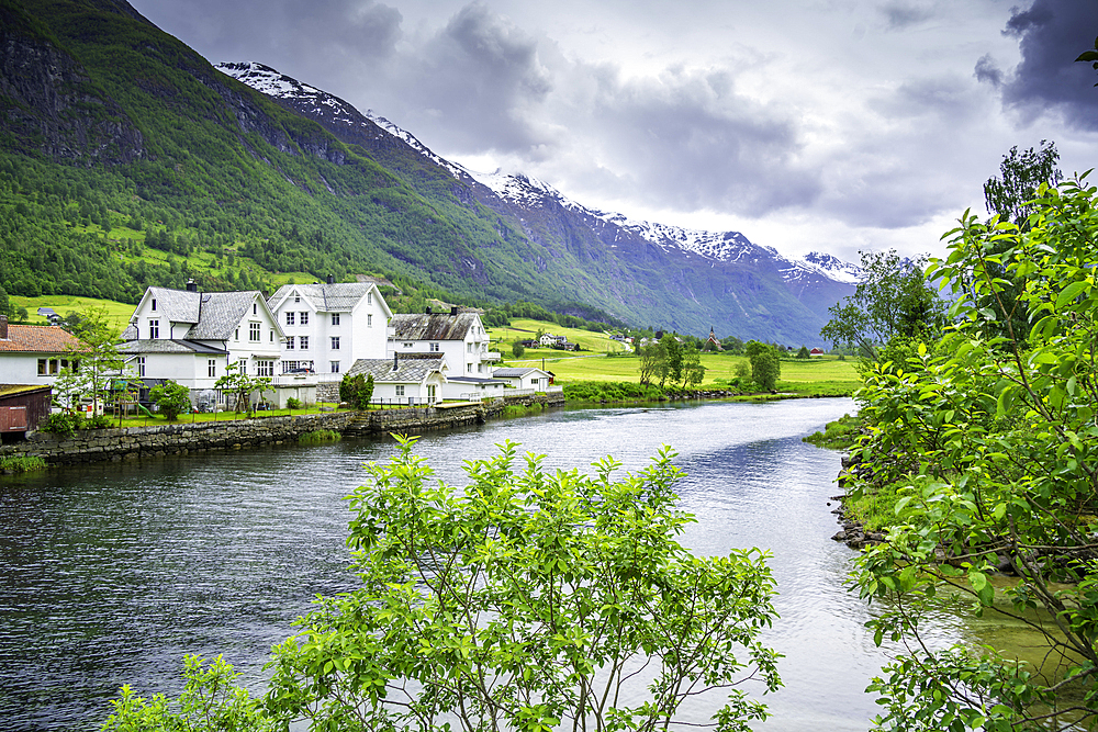 View of Olden village, mountains and Oldeelva river in Nordfjorden during summer, Norway, Scandinavia, Europe