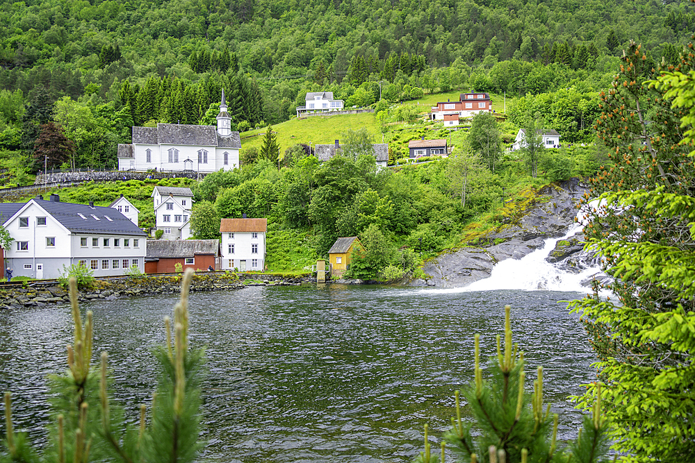 View of Sunnylven church and Hellesylt waterfall in Hellesylt, Sunnylvsfjorden, Stranda Municipality, Norway, Scandinavia, Europe