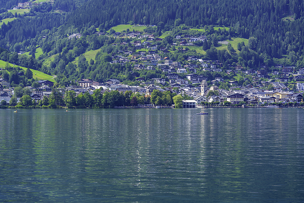 View of Zell am See and Lake Zell from cruise boat on a sunny day, Zell am See, Salzburg, Austria, Europe