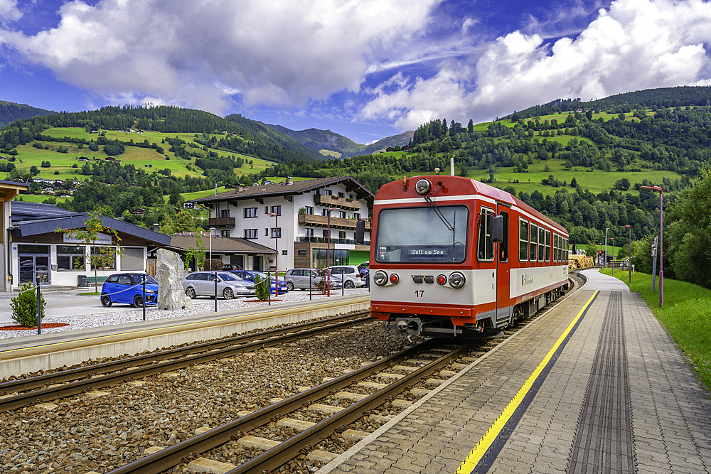 View of local train in Niedernsill on a sunny day, Niedernsill, Zell am See district, Salzburger Land, Austria, Europe