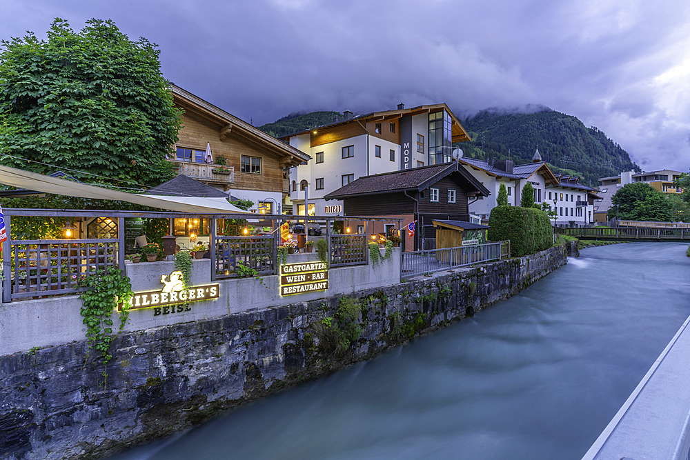 View of town and river in Kaprun at dusk during summer, Kaprun, Zell am See, Salzburg, Austria, Europe