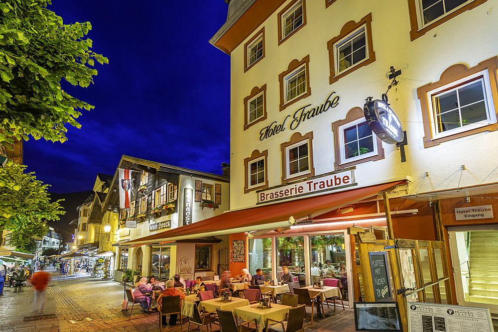 View of restaurant in Zell am See at dusk, Zell am See, Salzburg, Austria, Europe