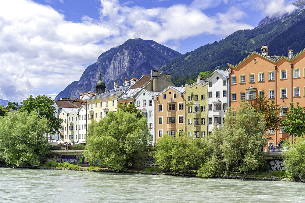 View of colourful buildings and River Inn on a sunny day in summer, Innsbruck, Tyrol Region, Austria, Europe