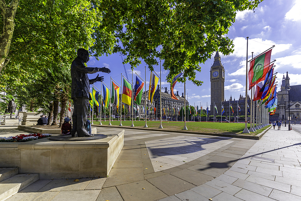 View of Nelson Mandella statue and Big Ben clock tower in Parliament Square during summer, Westminster, London, England, United Kingdom, Europe