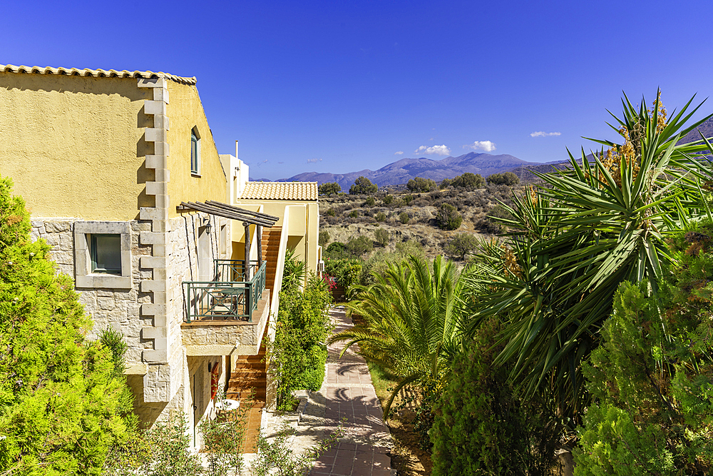 View of holiday homes and landscape in Limenas Chersonisou, Crete, Greek Islands, Greece, Europe