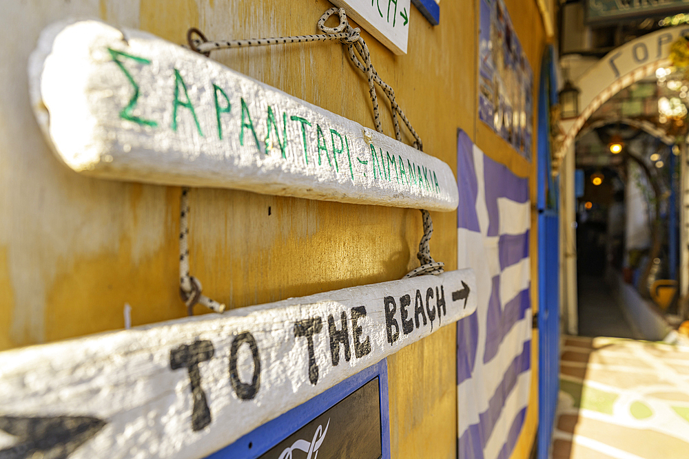View of 'To the beach' sign in Limenas Chersonisou, Crete, Greek Islands, Greece, Europe