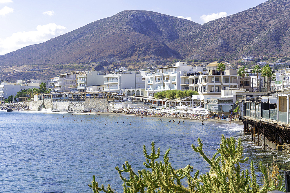 View of coastline and Paralia Limena Chersonisou Beach in Limenas Chersonisou, Crete, Greek Islands, Greece, Europe