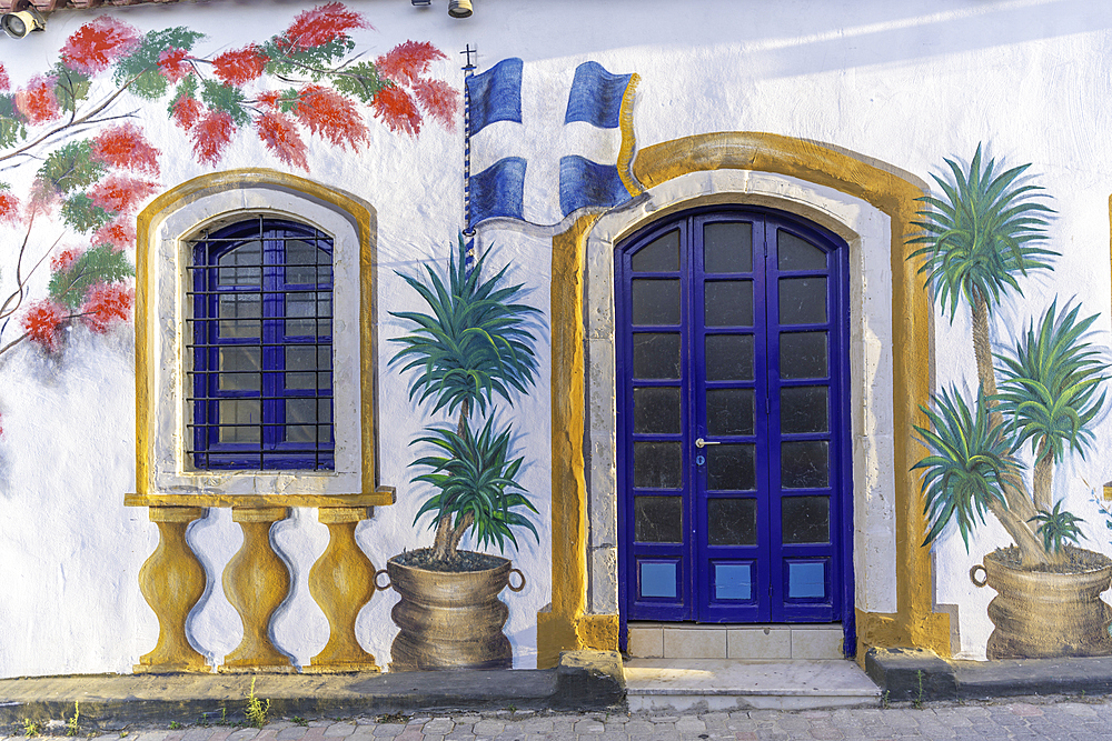 View of colourful painting on building in Chersonisos village, Piskopiano, Crete, Greek Islands, Greece, Europe
