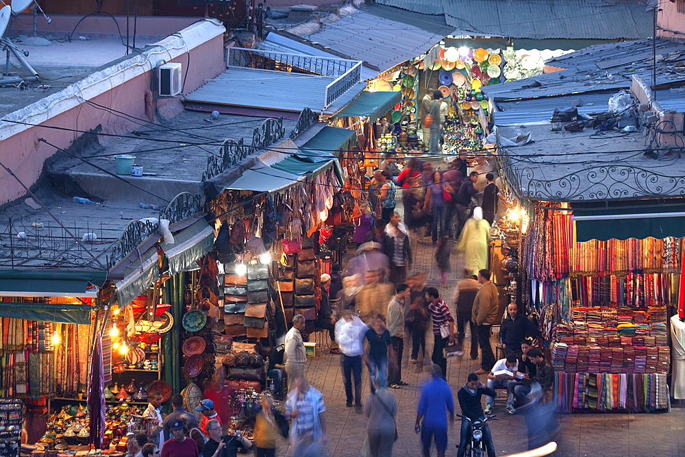 View over market square at dusk, Place Jemaa El Fna, Marrakesh, Morocco, North Africa, Africa