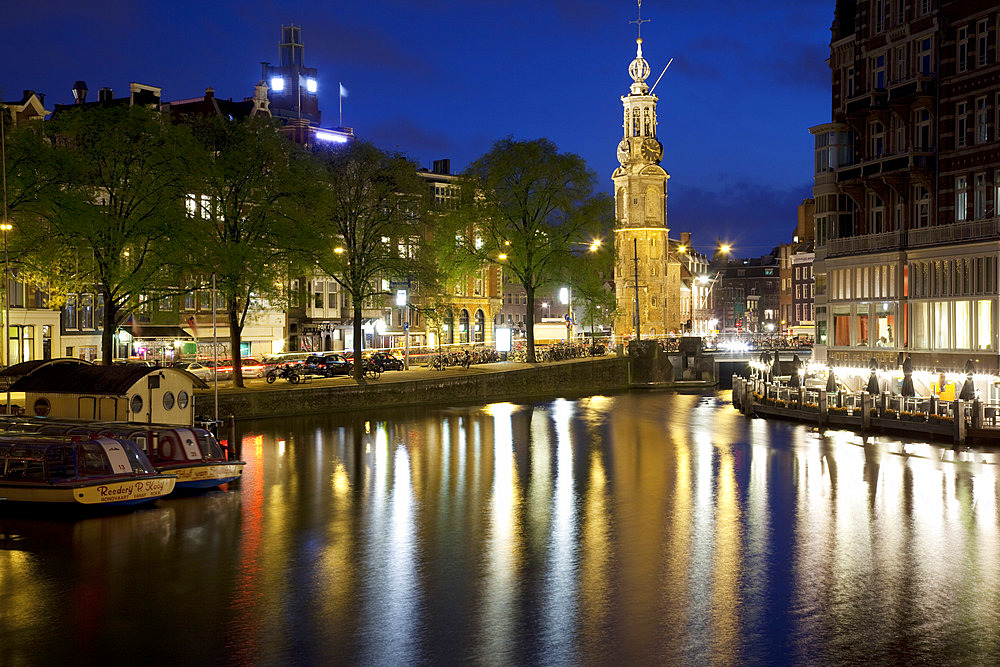 Munttoren and canal at dusk, Amsterdam, Holland, Europe