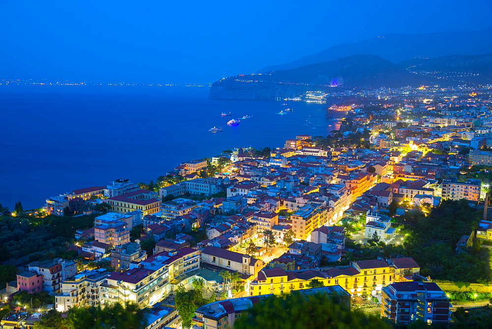 Panoramic view of Sorrento at night, Sorrento, Amalfi Coast, UNESCO World Heritage Site, Campania, Italy, Europe