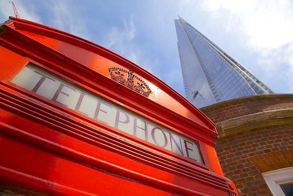 Red telephone box and The Shard, London, England, United Kingdom, Europe