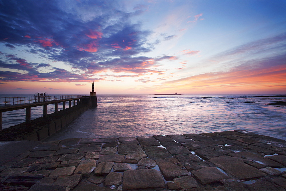 Amble Harbour Light and Coquet Island at dawn, Northumberland, England, United Kingdom, Europe