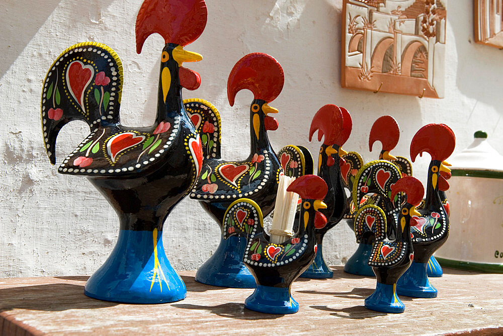 Barcelos cockerels in souvenir shop, Obidos, Estremadura, Portugal, Europe