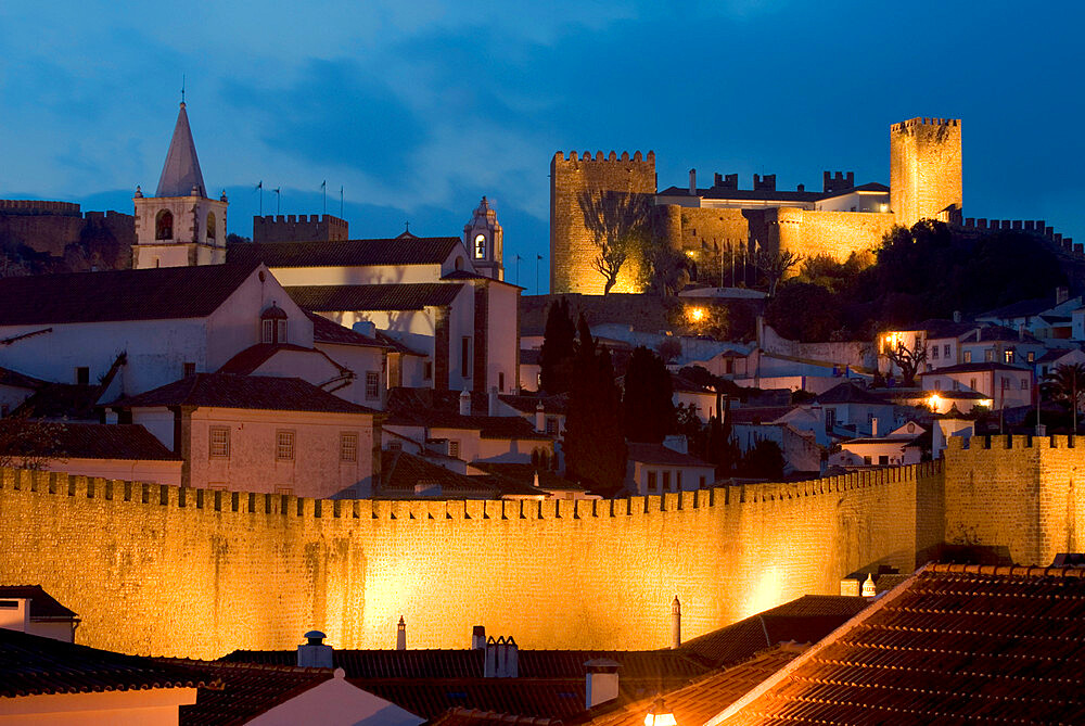 Night view of old town and castle walls, Obidos, Estremadura, Portugal, Europe