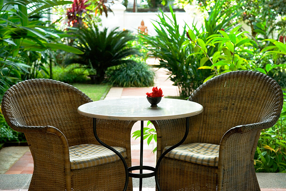 Terrace table and chairs in hotel, Kochi (Cochin), Kerala, India, Asia