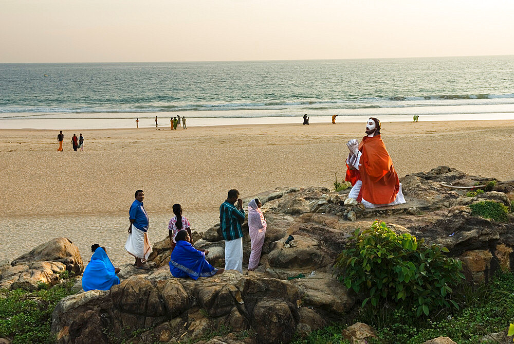 Christian worshippers in evening, Chowara Beach, near Kovalam, Kerala, India, Asia