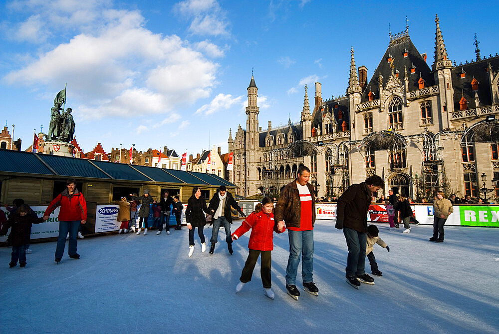 Christmas Ice Rink in the Market Square, Bruges, West Vlaanderen (Flanders), Belgium, Europe