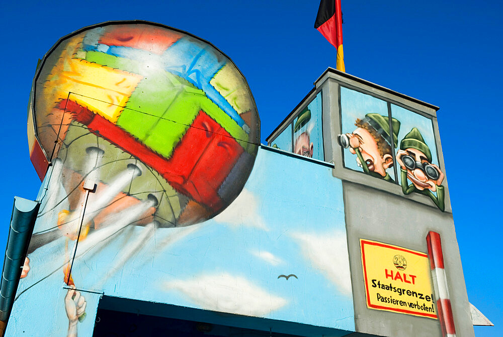 Mock guard tower on the remains of the Berlin Wall at the East Side Gallery, Berlin, Germany, Europe