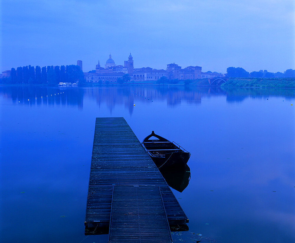 Dawn mist over old town and Lake Inferiore, Mantua, Lombardy, Italy, Europe