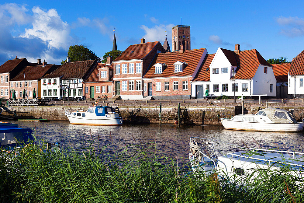 River Ribe and riverfront houses and tower of Ribe Domkirke, Ribe, Jutland, Denmark, Scandinavia, Europe