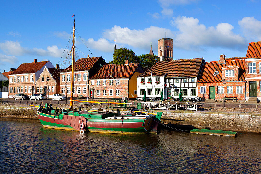 Riverfront houses and tower of Ribe Domkirke, Ribe, Jutland, Denmark, Scandinavia, Europe