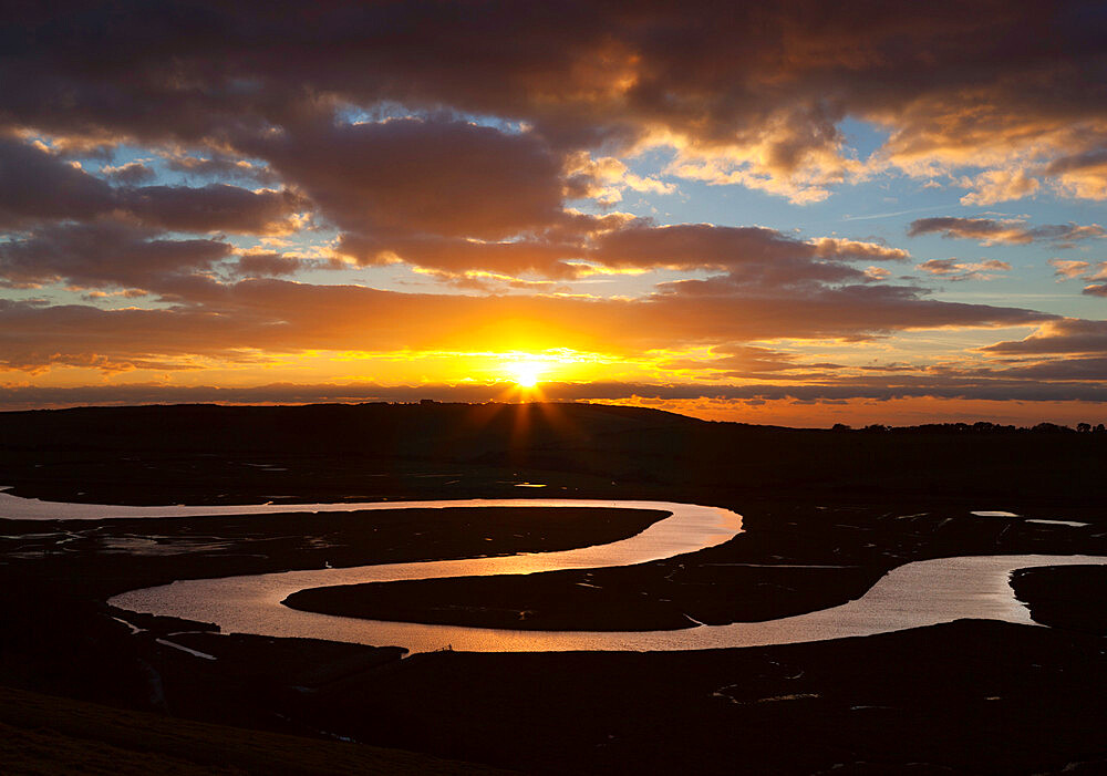 Cuckmere River meanders at sunset, near Seaford, South Downs National Park, East Sussex, England, United Kingdom, Europe