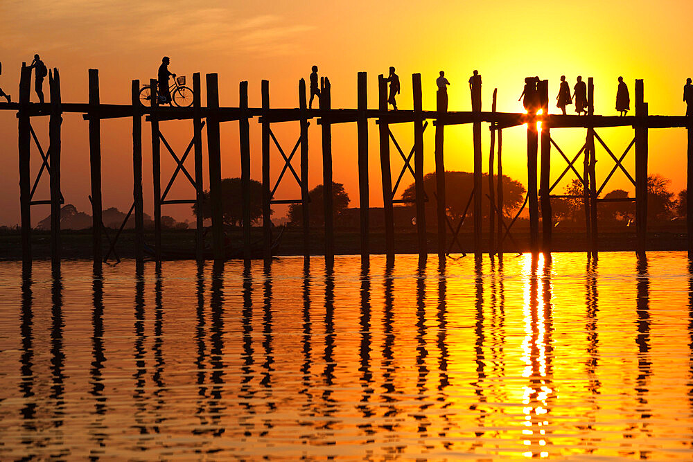 U Bein's Bridge on Taungthaman Lake at sunset, Amarapura, Mandalay, Myanmar (Burma), Asia