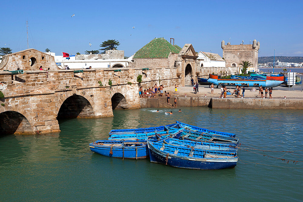 Fishing boats below the ramparts of the old fort, Essaouira, Atlantic coast, Morocco, North Africa, Africa