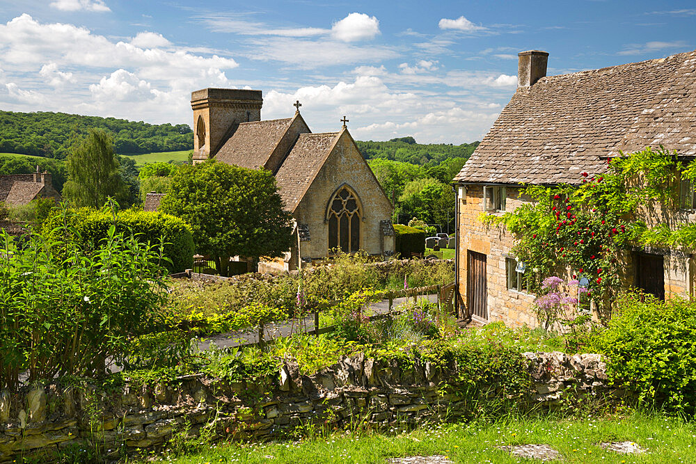 St. Barnabas Church and rose covered Cotswold cottage, Snowshill, Cotswolds, Gloucestershire, England, United Kingdom, Europe