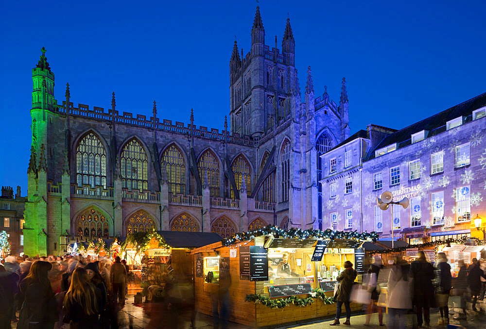 Bath Christmas Market outside Bath Abbey at night, Bath, Somerset, England, United Kingdom, Europe