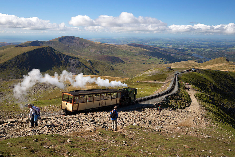 Snowdon Mountain Railway train and the Llanberis path, Snowdon, Snowdonia National Park, Gwynedd, Wales; United Kingdom, Europe