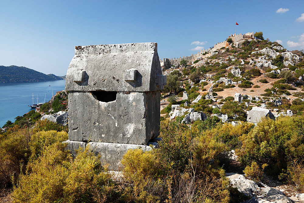 Lycian sarcophagus and castle, Simena (Kalekoy), Kekova, Lycia, Antalya, Mediterranean Coast, Southwest Turkey, Anatolia, Turkey, Asia Minor, Eurasia