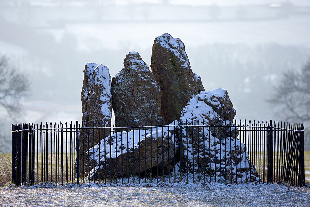 The Whispering Knights in snow, The Rollright Stones, near Chipping Norton, Cotswolds, Oxfordshire, England, United Kingdom, Europe