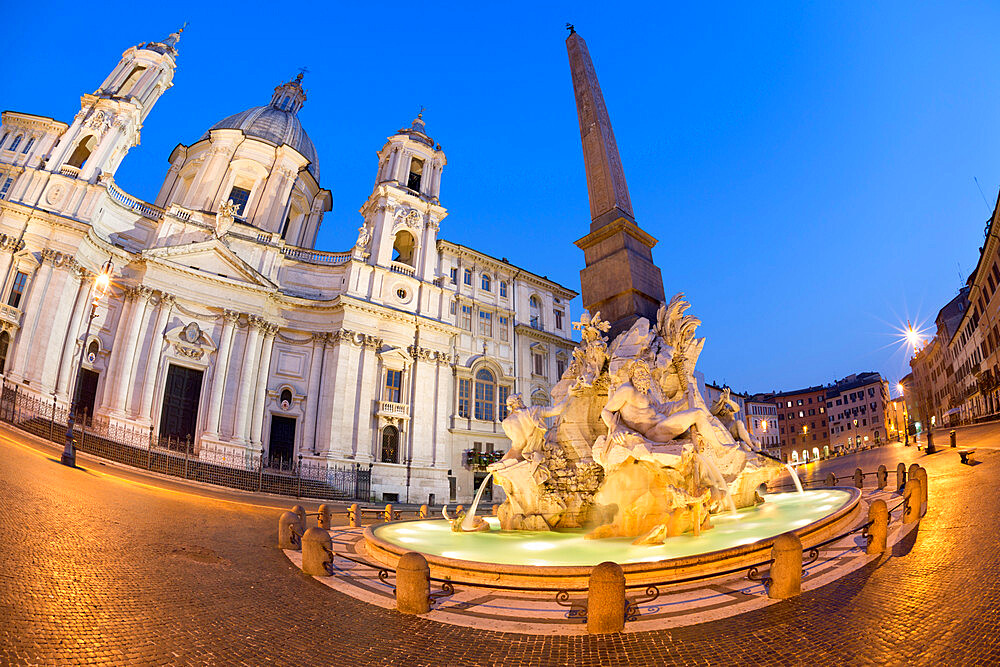 Bernini's Fountain of the Four Rivers and church of Sant'Agnese in Agone at night, Piazza Navona, Rome, Lazio, Italy, Europe