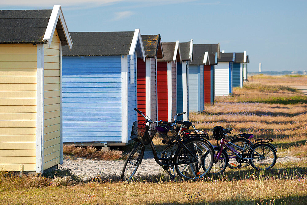 Colourful beach huts and bicycles, Skanor Falsterbo, Falsterbo Peninsula, Skane, South Sweden, Sweden, Scandinavia, Europe