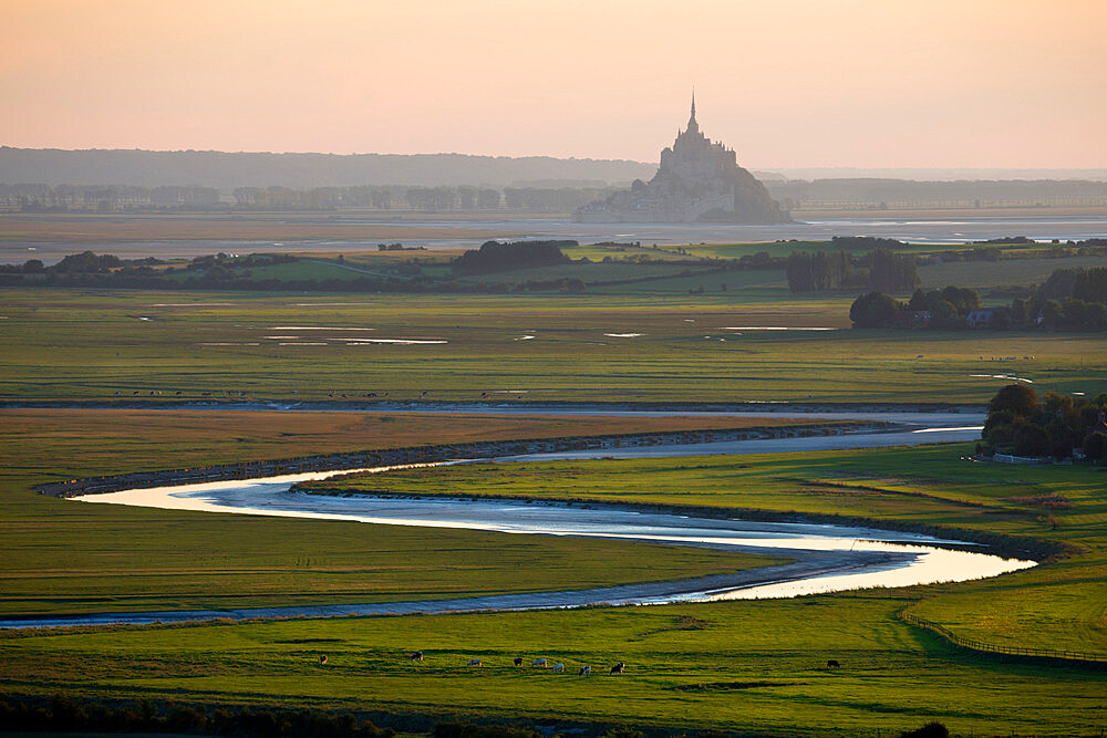 View over meandering river to Bay of Mont Saint-Michel, UNESCO World Heritage Site, from Jardin des Plantes viewpoint, Avranches, Normandy, France, Europe