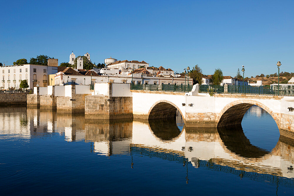 Seven arched Roman bridge and town on the Rio Gilao river, Tavira, Algarve, Portugal, Europe