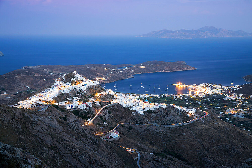 View over Livadi Bay and hilltop town of Pano Chora at night, Serifos, Cyclades, Aegean Sea, Greek Islands, Greece, Europe