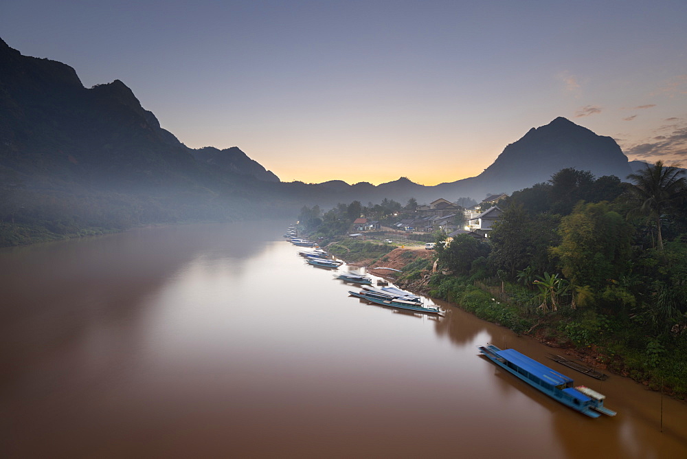 Sunset over the misty Nam Ou River at the village of Nong Khiaw, Luang Prabang Province, Northern Laos, Laos, Indochina, Southeast Asia, Asia