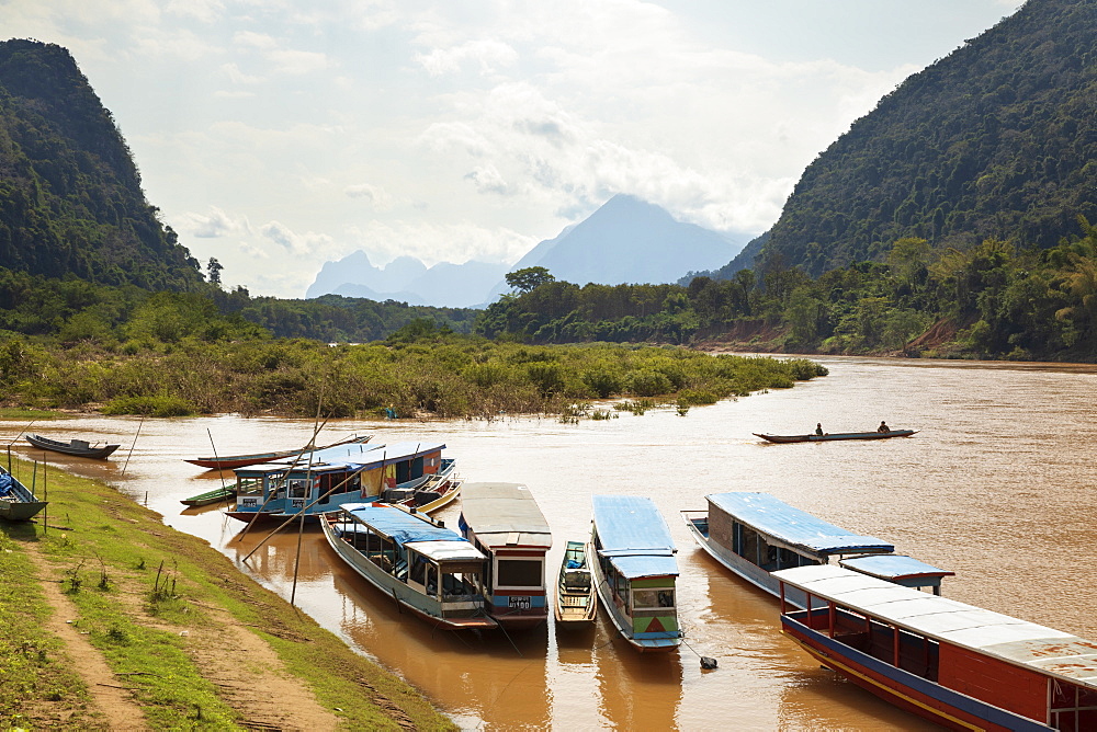 Boats on the Nam Ou River at Muang Ngoi Neua, Muang Ngoi District, Luang Prabang Province, Northern Laos, Laos, Indochina, Southeast Asia, Asia