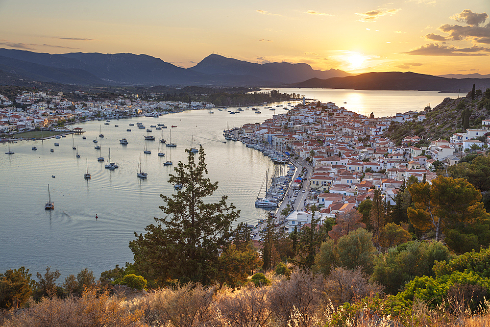 View over Poros town at sunset, Poros, Saronic islands, Greek Islands, Greece, Europe