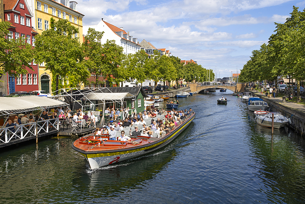 Boat tour along canal in the Christianshavn area of the city, Copenhagen, Zealand, Denmark, Europe