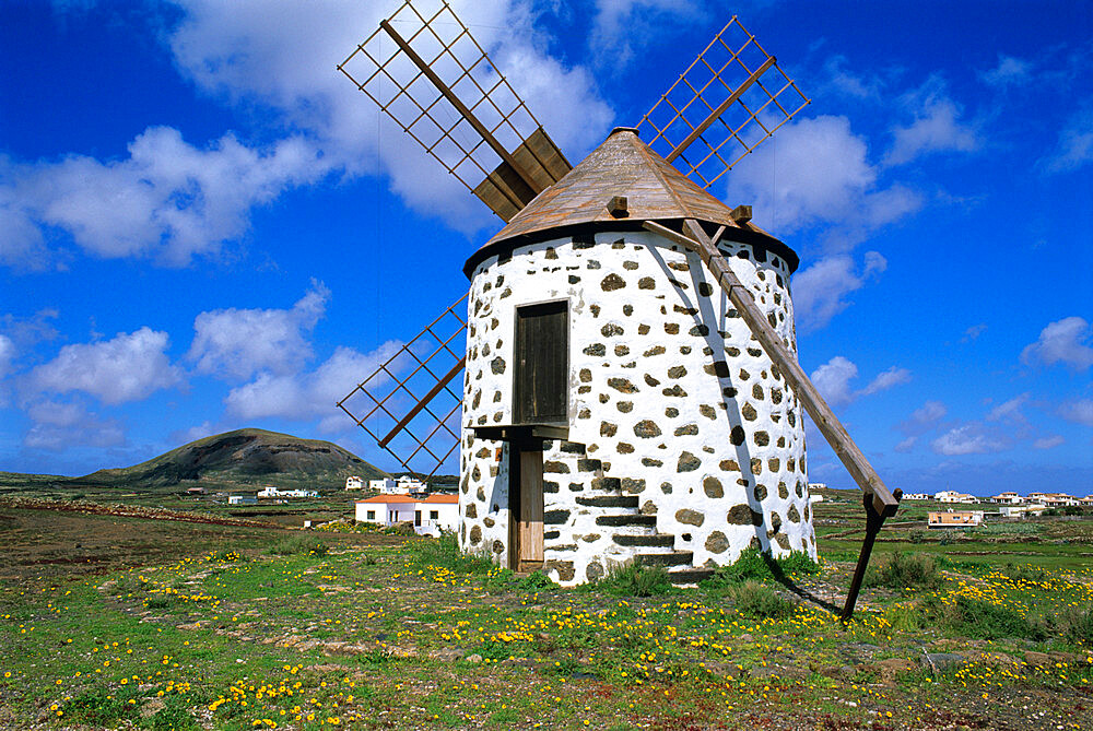 Windmill set in volcanic landscape, Villaverde, Fuerteventura, Canary Islands, Spain, Europe