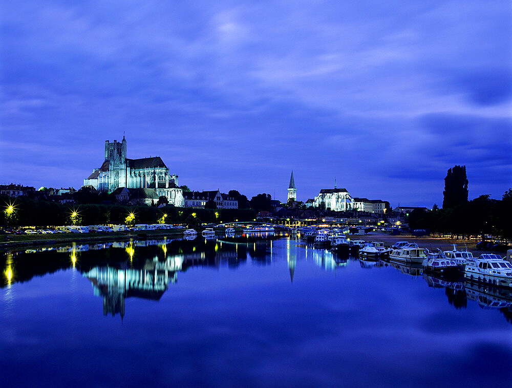 River Yonne and Cathedral (Cathedrale Saint-Etienne d'Auxerre) at dusk, Auxerre, Burgundy, France, Europe