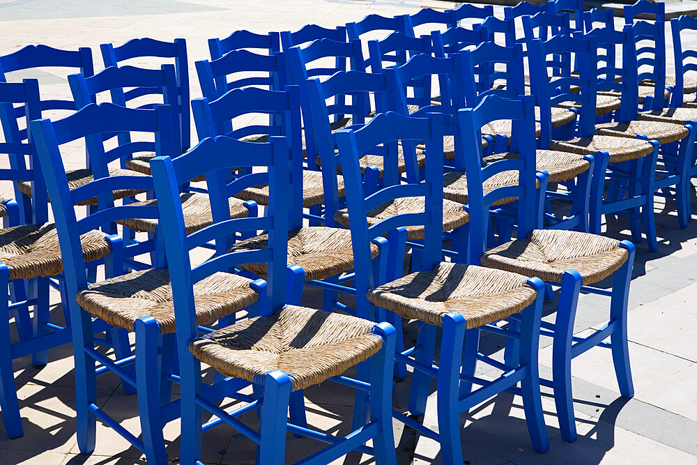 Blue Greek restaurant chairs, Crete, Greek Islands, Greece, Europe