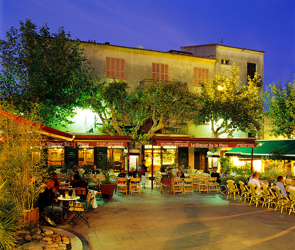 Cafes in main square of old town, Porto Vecchio, Corsica, France, Europe