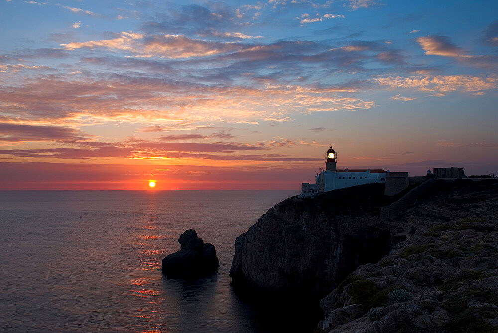 Lighthouse at sunset, Cape St. Vincent, Algarve, Portugal, Europe